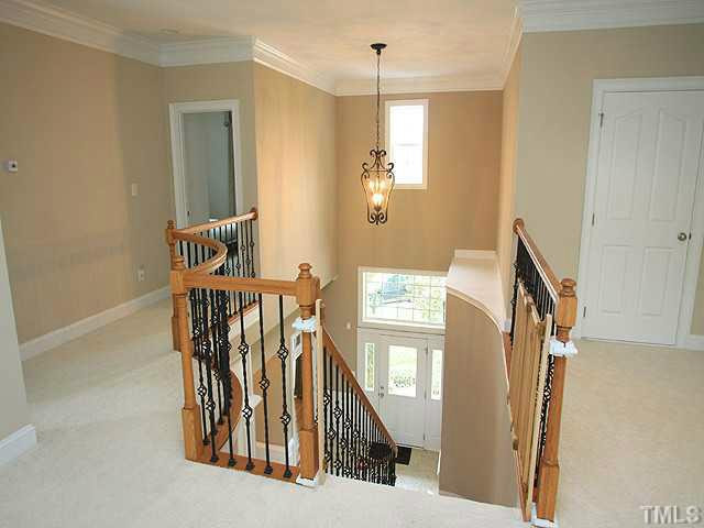 2259 Clayette Court Raleigh, NC 27612 - Photo 14 of 25 a view of entryway and hall with wooden floor