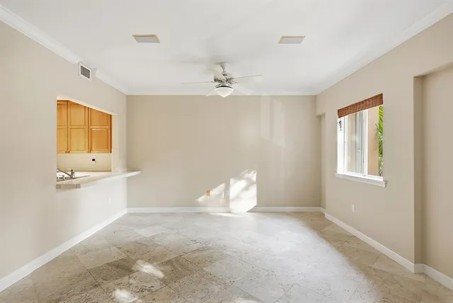a balcony with trees in front of it