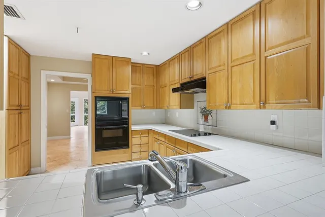 a balcony with trees in front of it