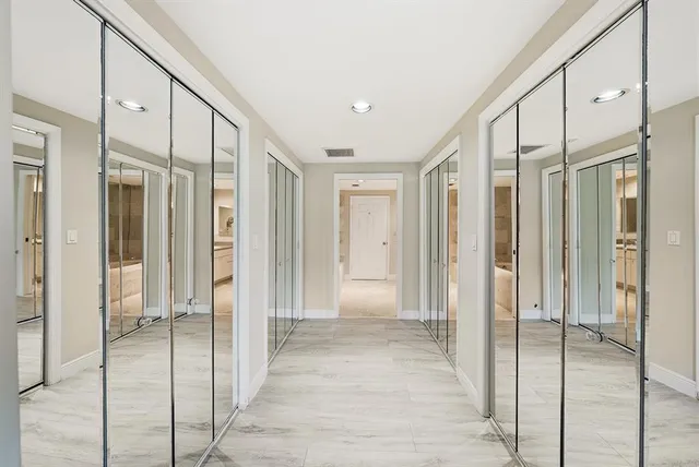 a front view of a building with garden