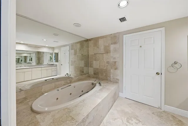 a view of balcony with wooden floor and fence