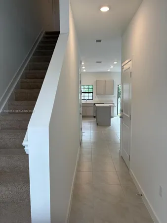 a view of kitchen and living room