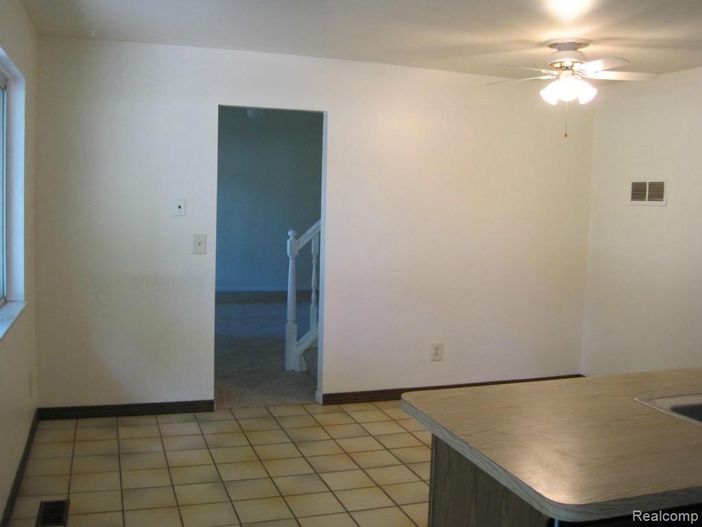 9202 Lee Road Brighton, MI 48116 - Photo 13 of 33 Dining and Living Room view