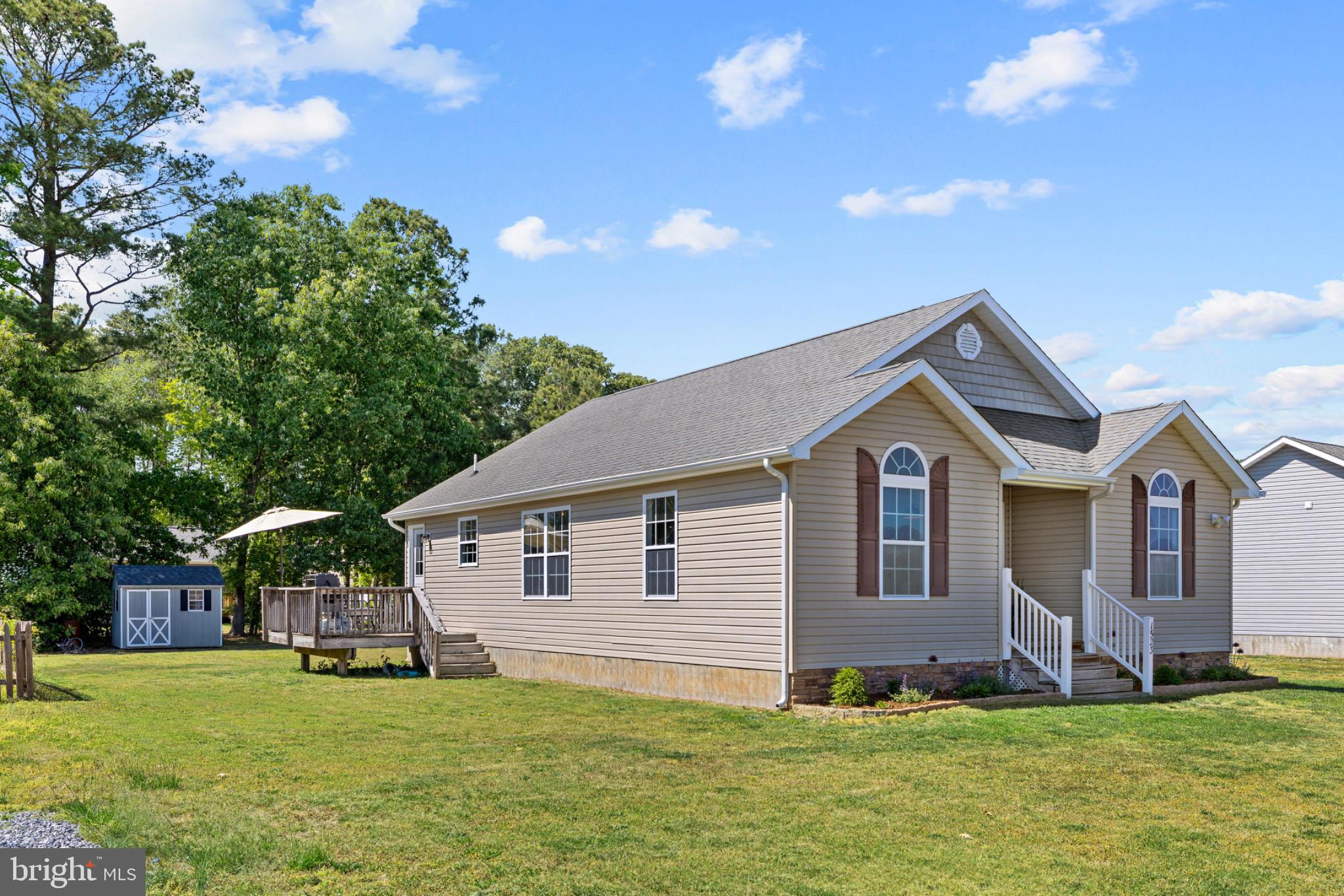 1523 Bowie Road Colonial Beach, VA 22443 - Photo 23 of 34 a front view of a house with a yard and garage