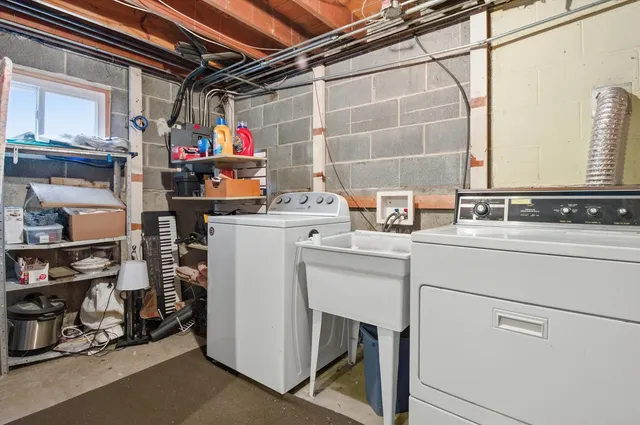 a utility room with dryer and washer