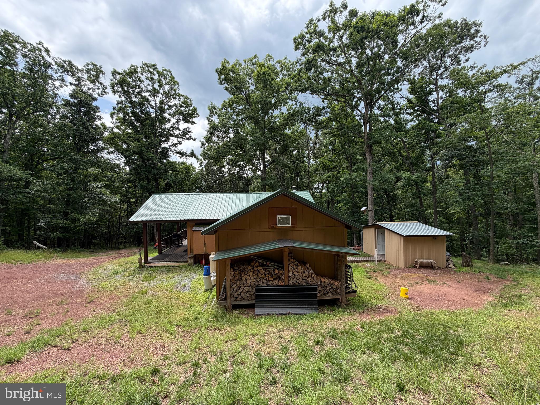 1419 Paul's Woods Road Delray, WV 26714 - Photo 62 of 105 a house that has sitting area in front of it