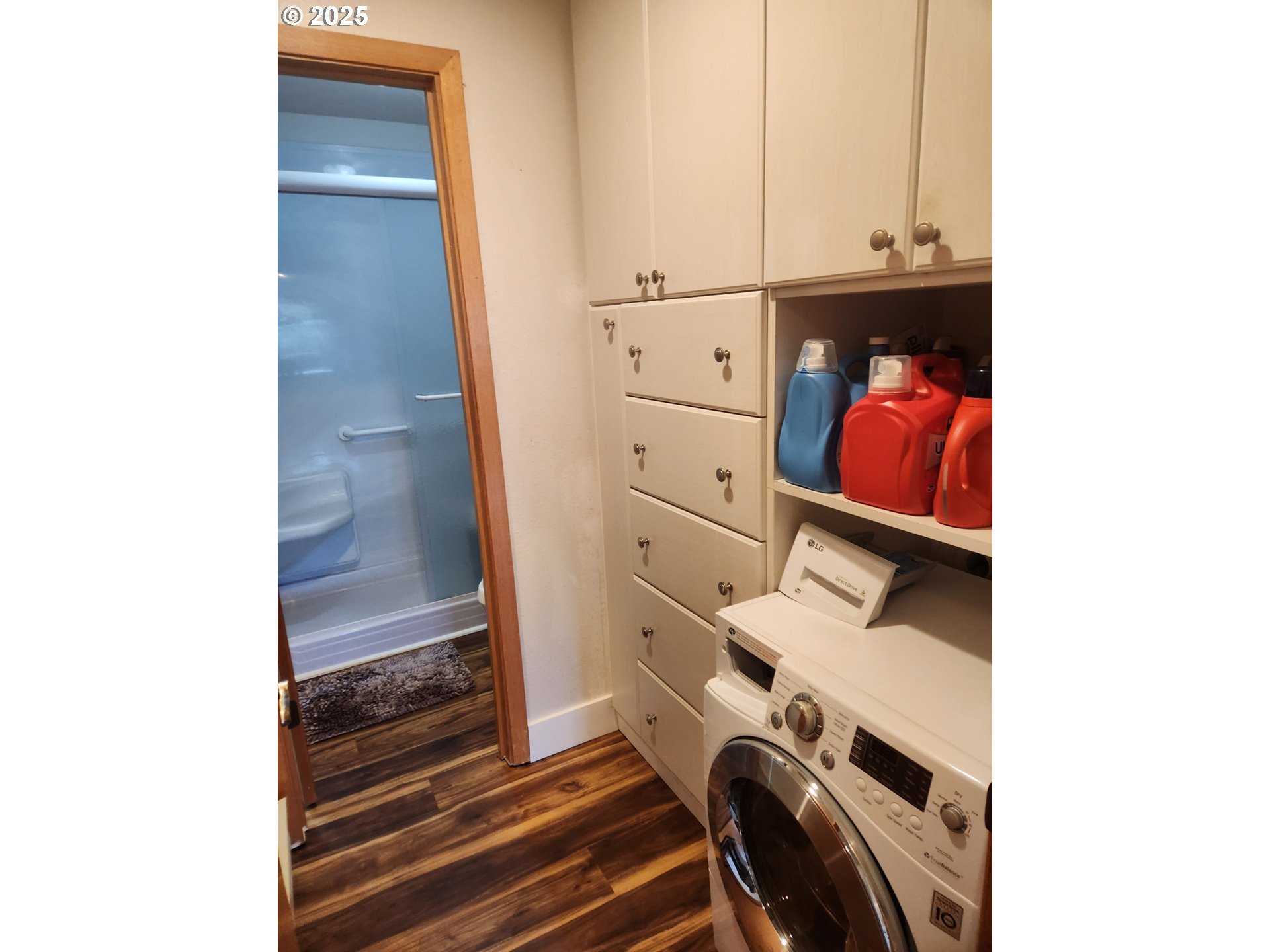950 Evergreen Road, Unit 229 Woodburn, OR 97071 - Photo 13 of 33 a view of walk in closet with clothes and shoes