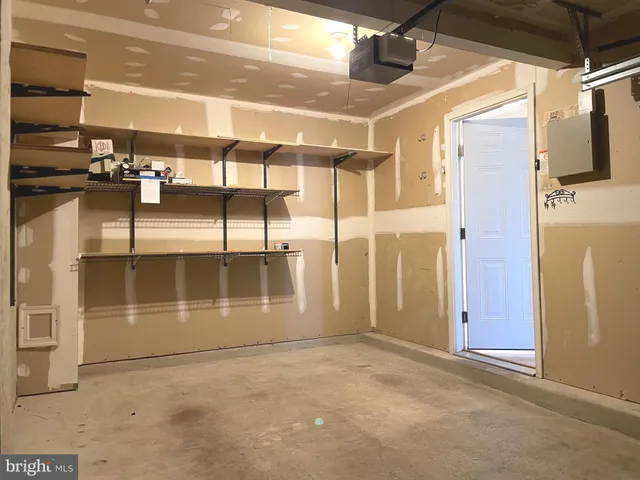 a view of a room with an empty space