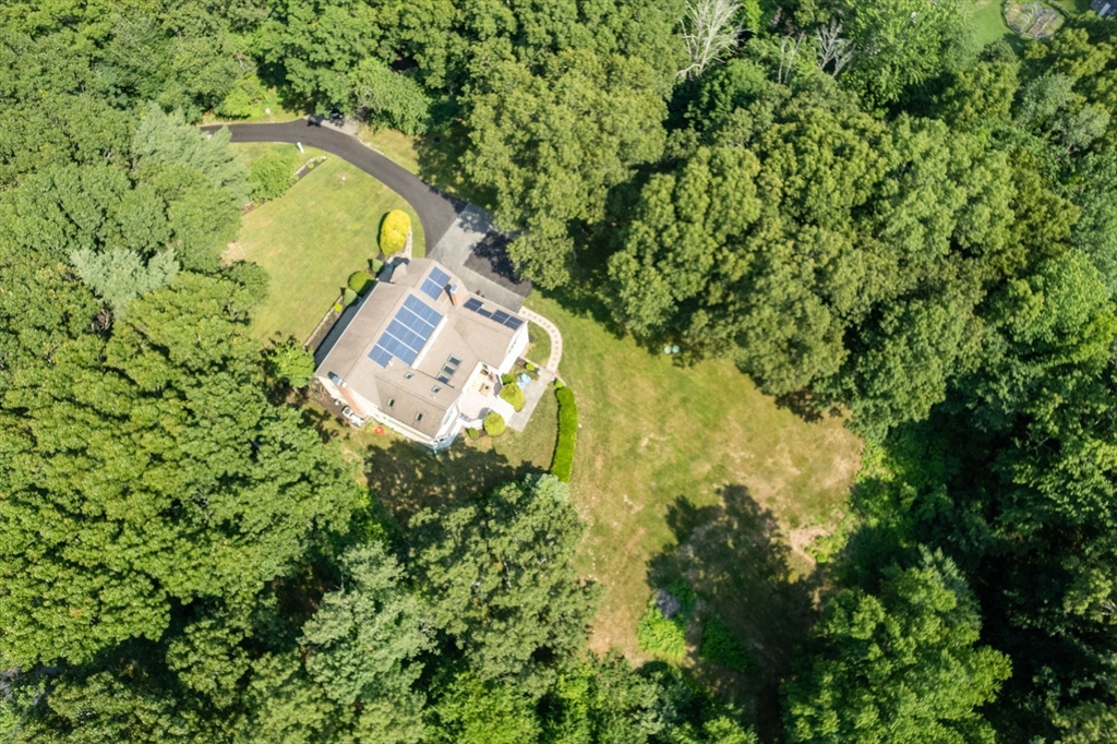 24 Russett Hill Road Sherborn, MA 01770 - Photo 37 of 39 an aerial view of a house with a yard and garden