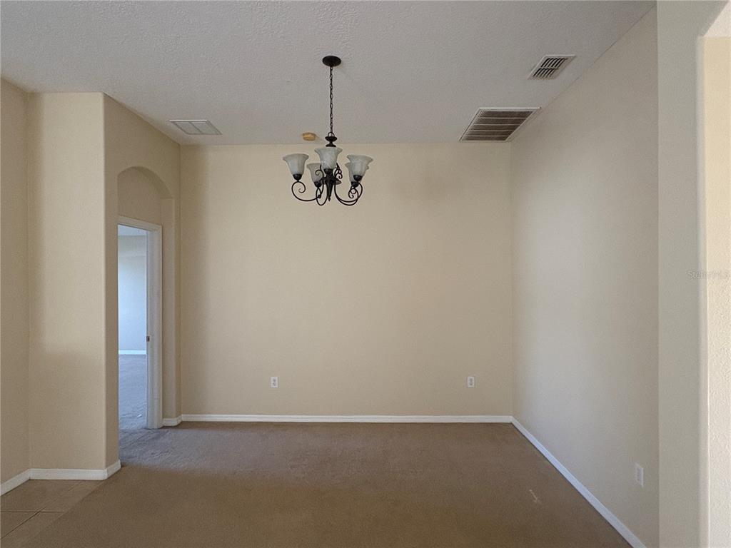 3878 Prescott Loop Lakeland, FL 33810 - Photo 5 of 12 a view of an empty room