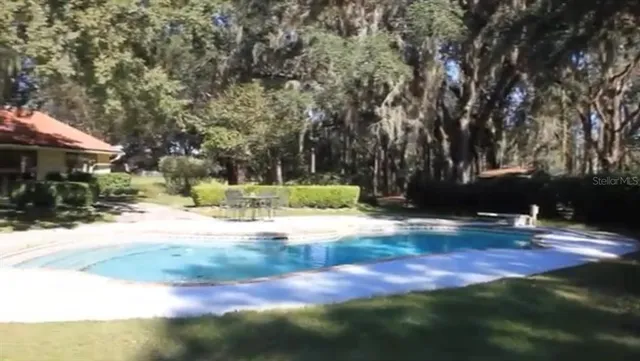 a view of back yard of the house