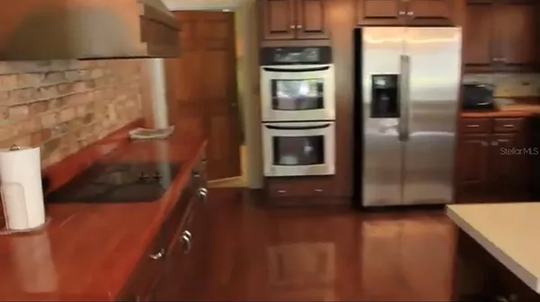a bathroom with a sink and a window