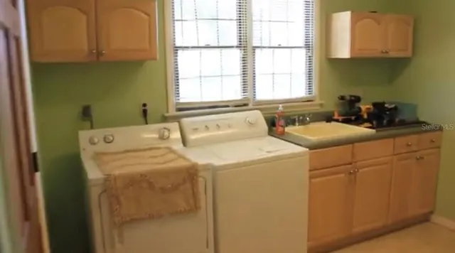 a bedroom with a bed and a mirror