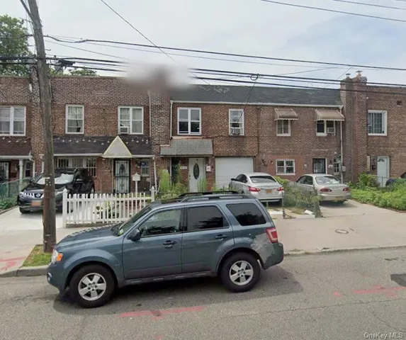 a car parked in front of a building