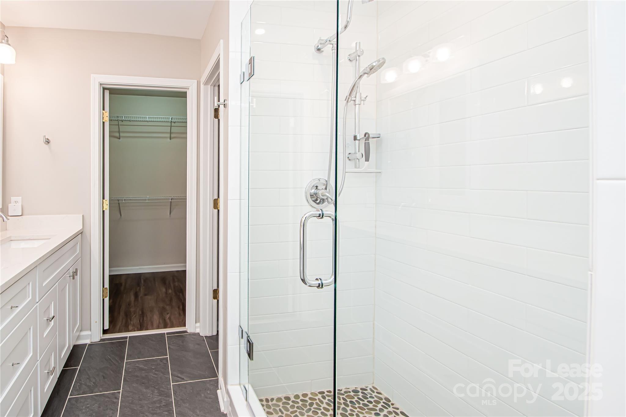 2121 Kaybird Lane Charlotte, NC 28270 - Photo 23 of 39 a bathroom with a shower and a glass door