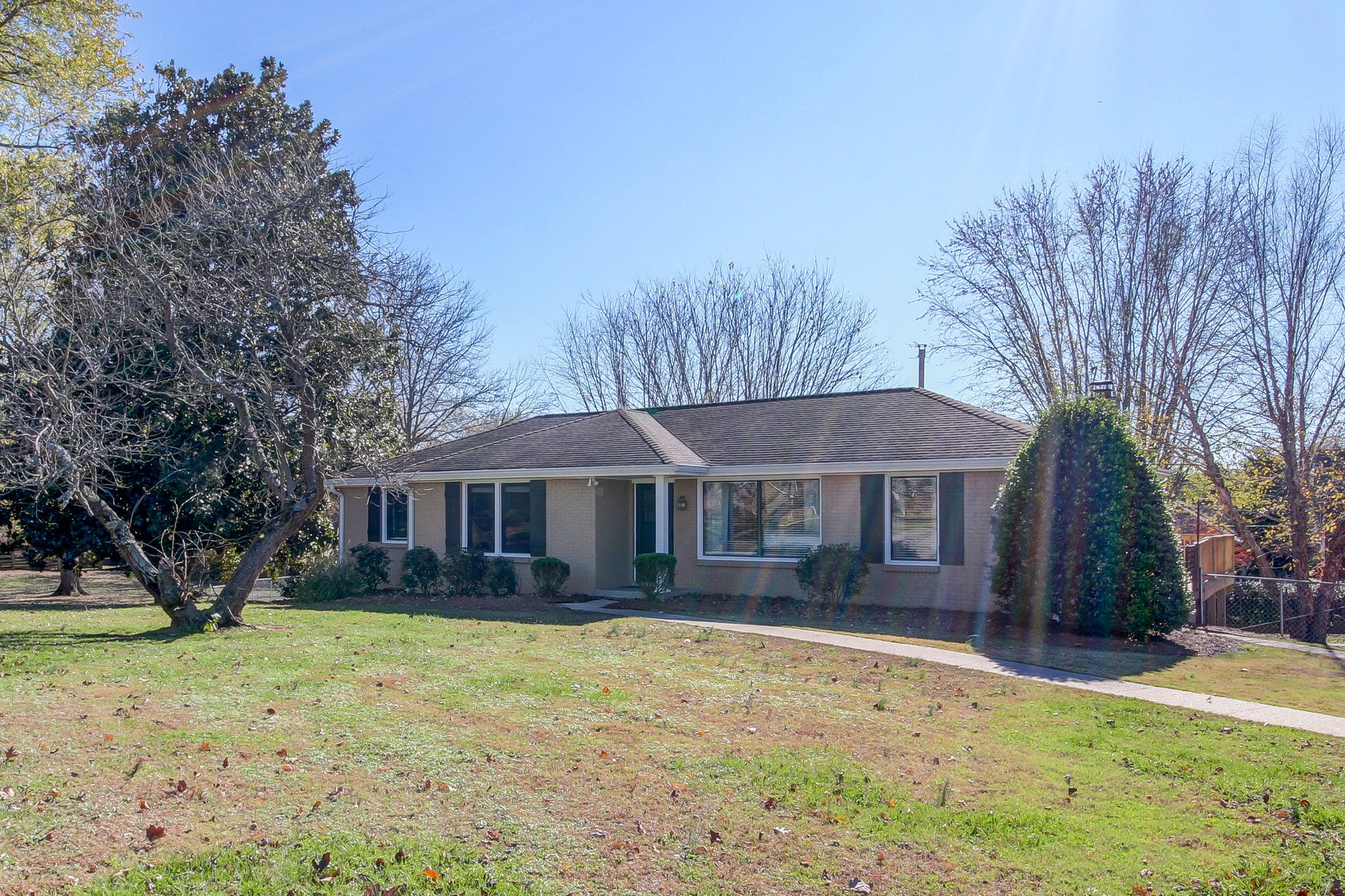 356 Kimbrough Road Clarksville, TN 37043 - Photo 1 of 50 a front view of a house with a yard covered with trees