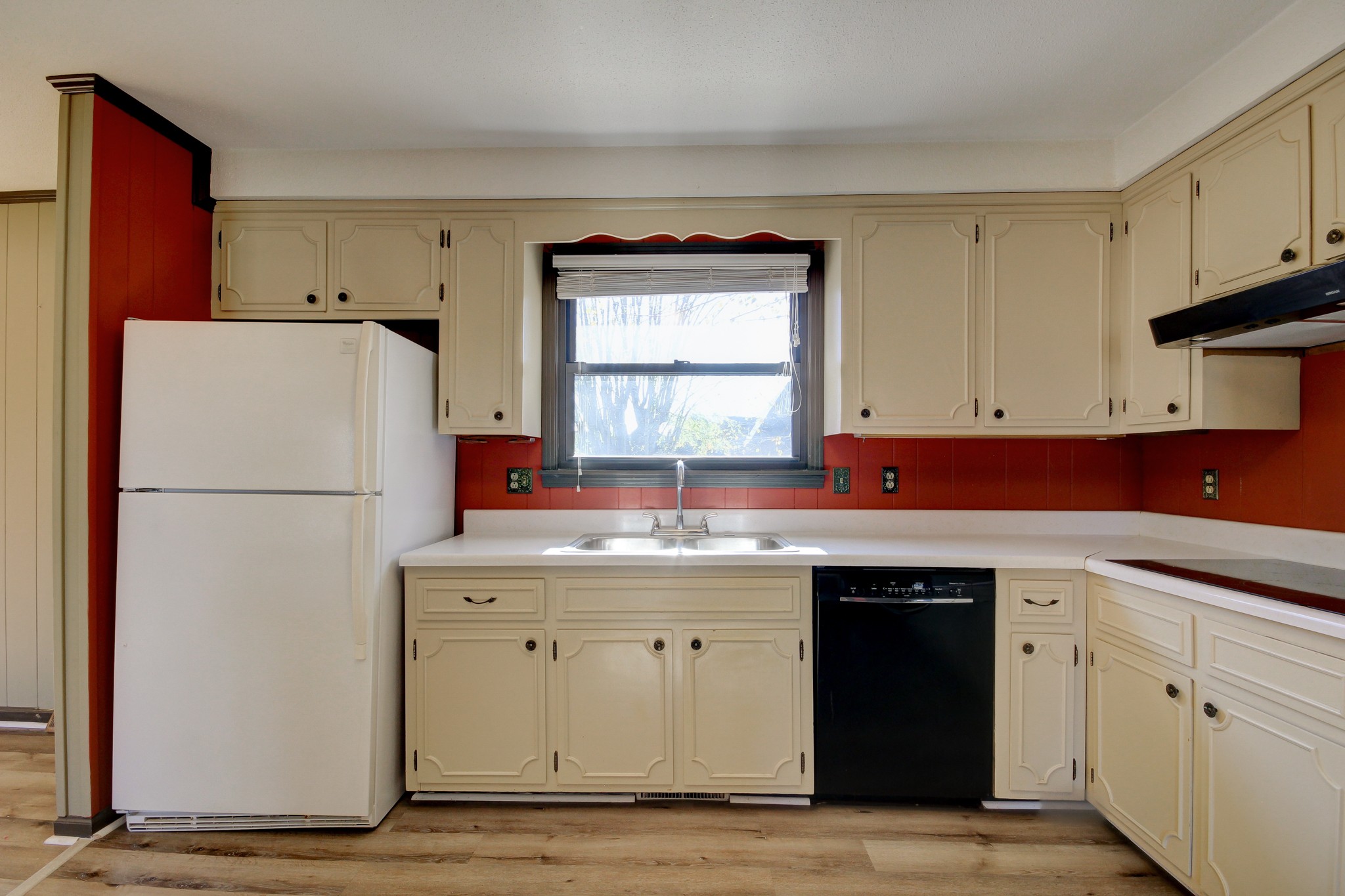 356 Kimbrough Road Clarksville, TN 37043 - Photo 14 of 50 a kitchen with a sink a refrigerator and cabinets