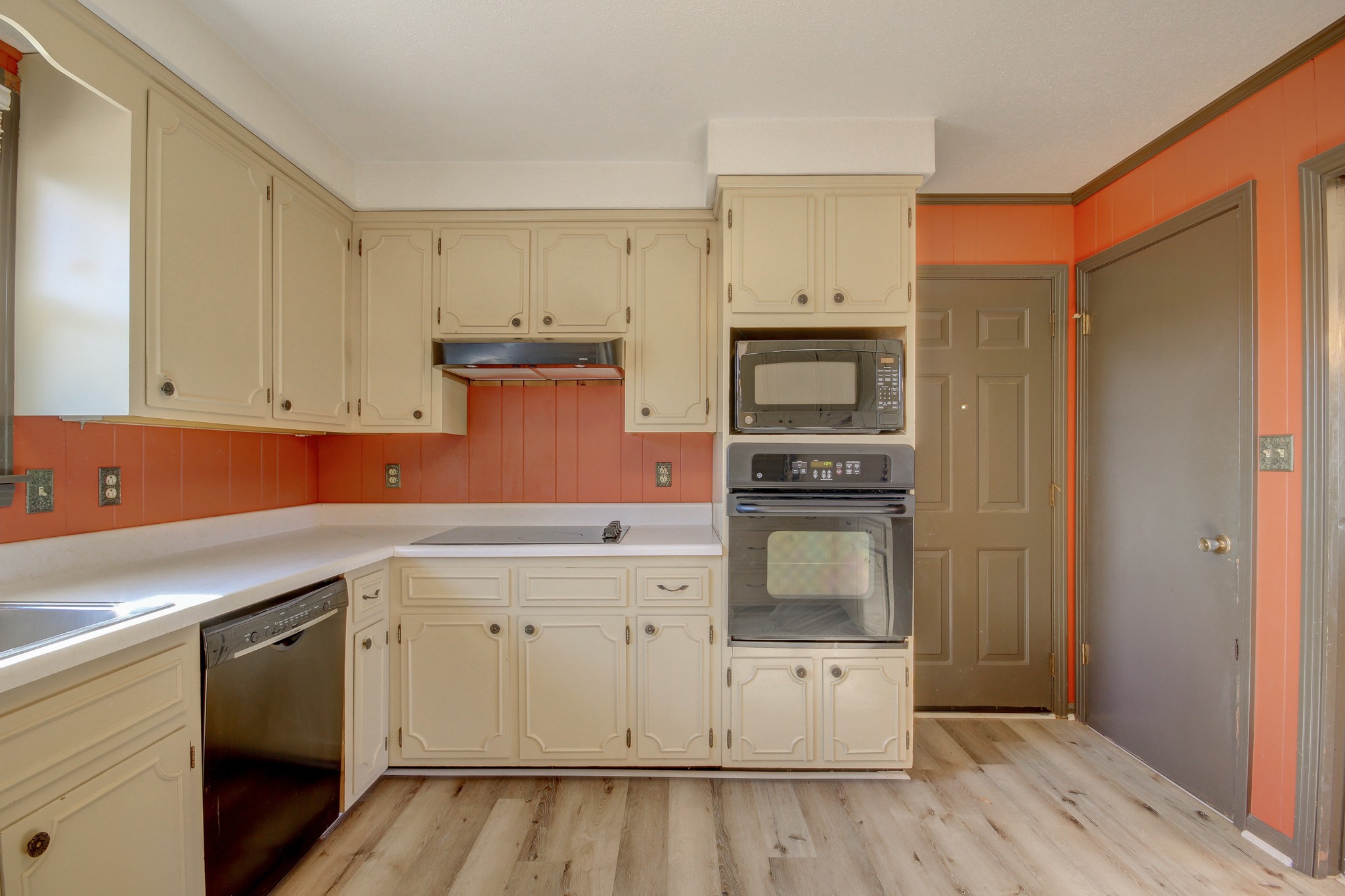 356 Kimbrough Road Clarksville, TN 37043 - Photo 15 of 50 a kitchen with cabinets appliances and a wooden floor