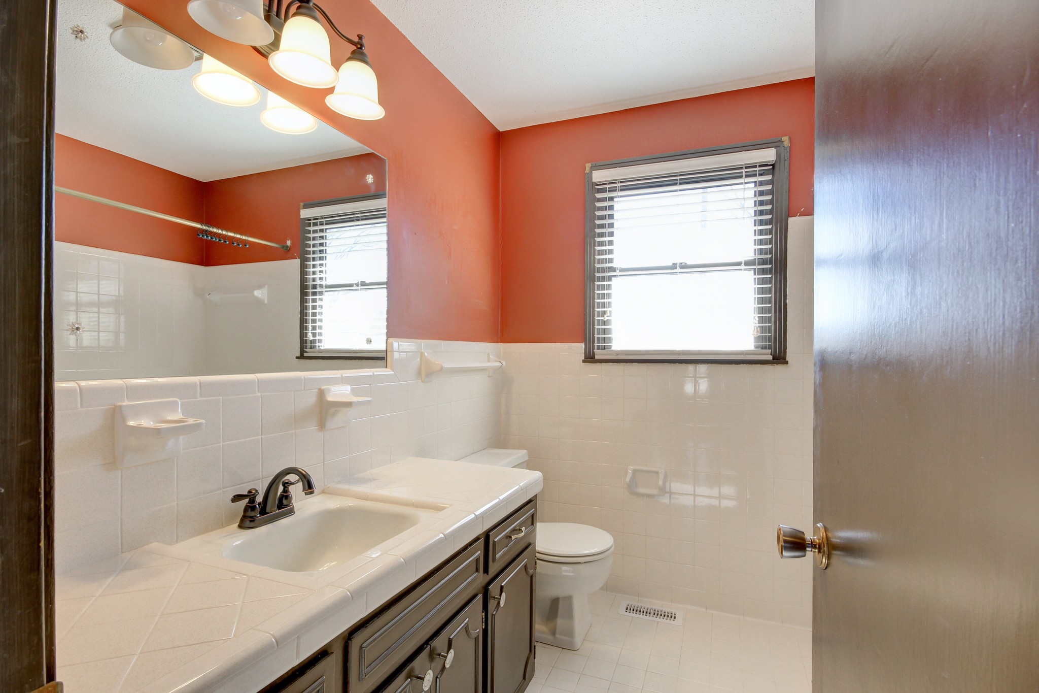 356 Kimbrough Road Clarksville, TN 37043 - Photo 22 of 50 a bathroom with a sink a toilet and a mirror