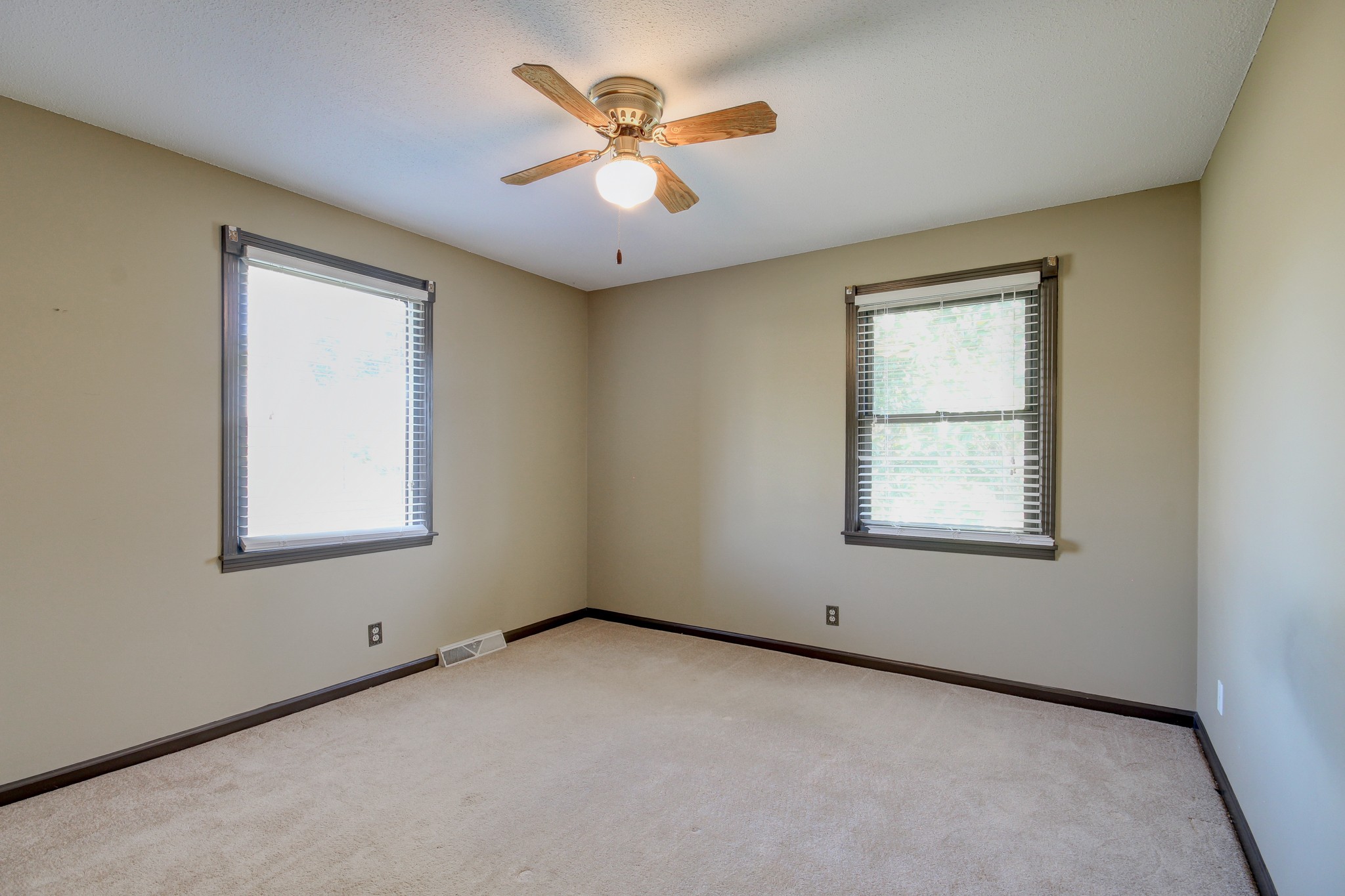 356 Kimbrough Road Clarksville, TN 37043 - Photo 30 of 50 an empty room with a window and a ceiling fan