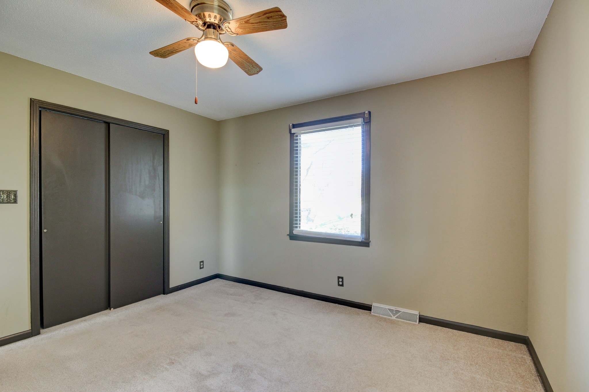 356 Kimbrough Road Clarksville, TN 37043 - Photo 31 of 50 an empty room with closet and a chandelier fan
