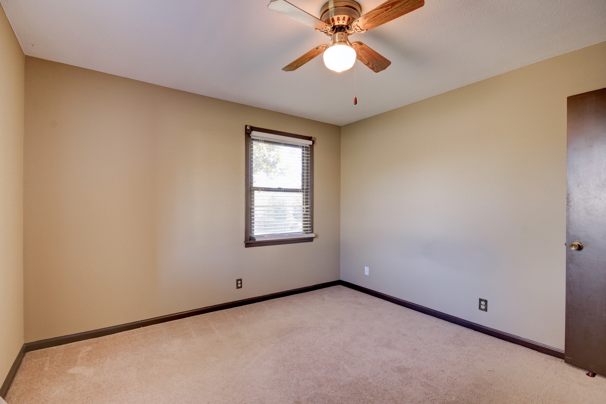356 Kimbrough Road Clarksville, TN 37043 - Photo 33 of 50 an empty room with a window and a fan