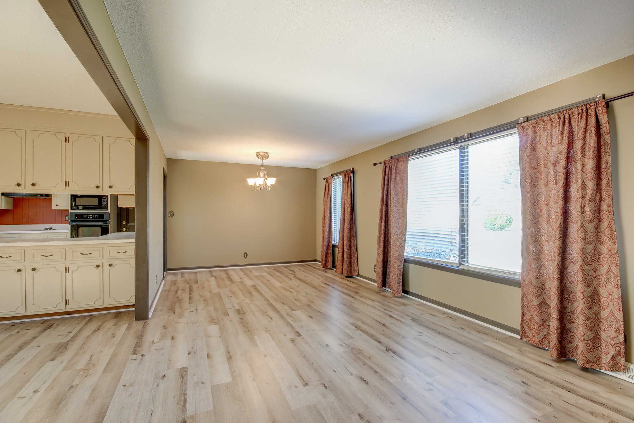 356 Kimbrough Road Clarksville, TN 37043 - Photo 5 of 50 wooden floor in an empty room with a window