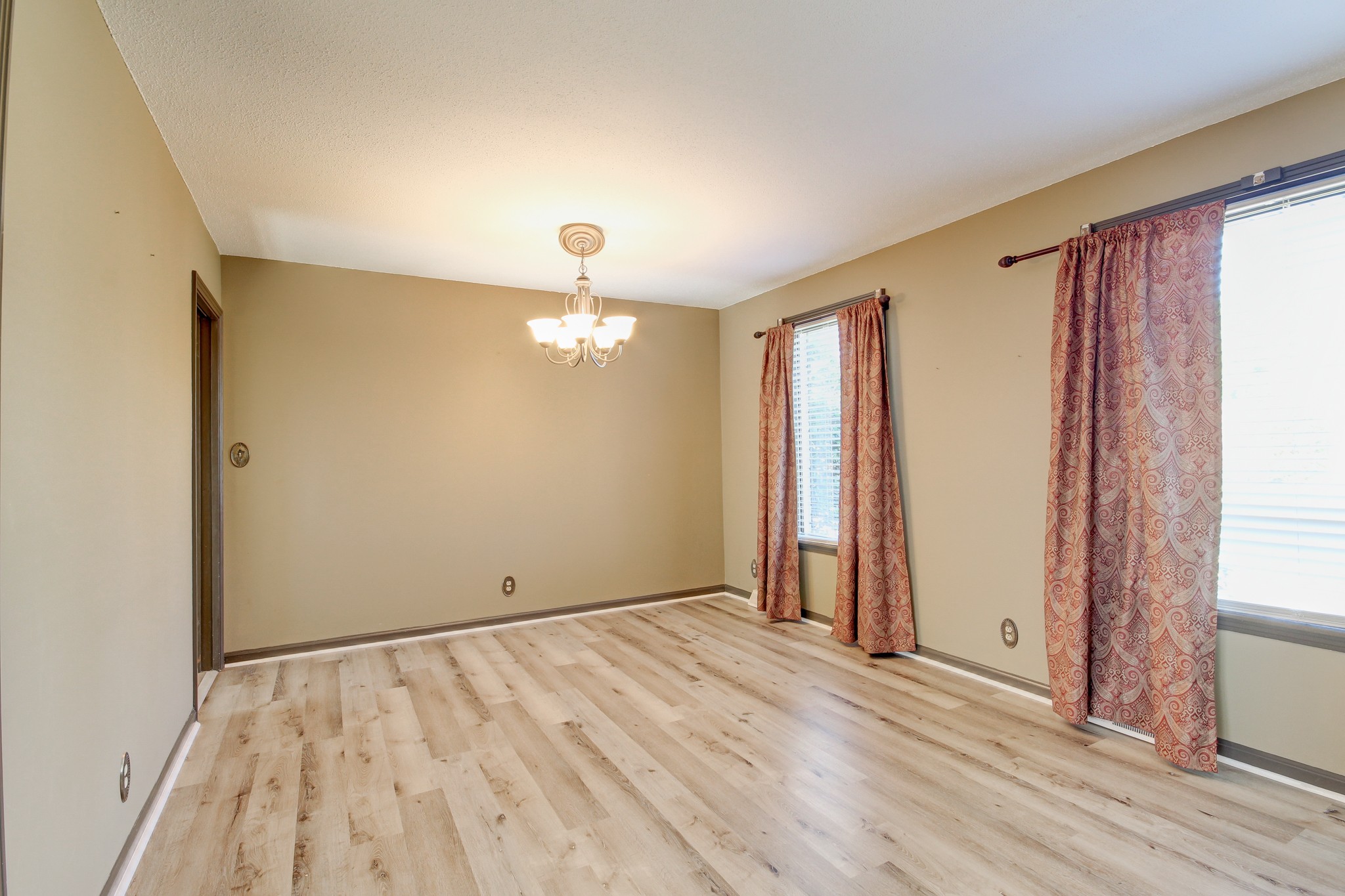 356 Kimbrough Road Clarksville, TN 37043 - Photo 8 of 50 wooden floor in an empty room with a window