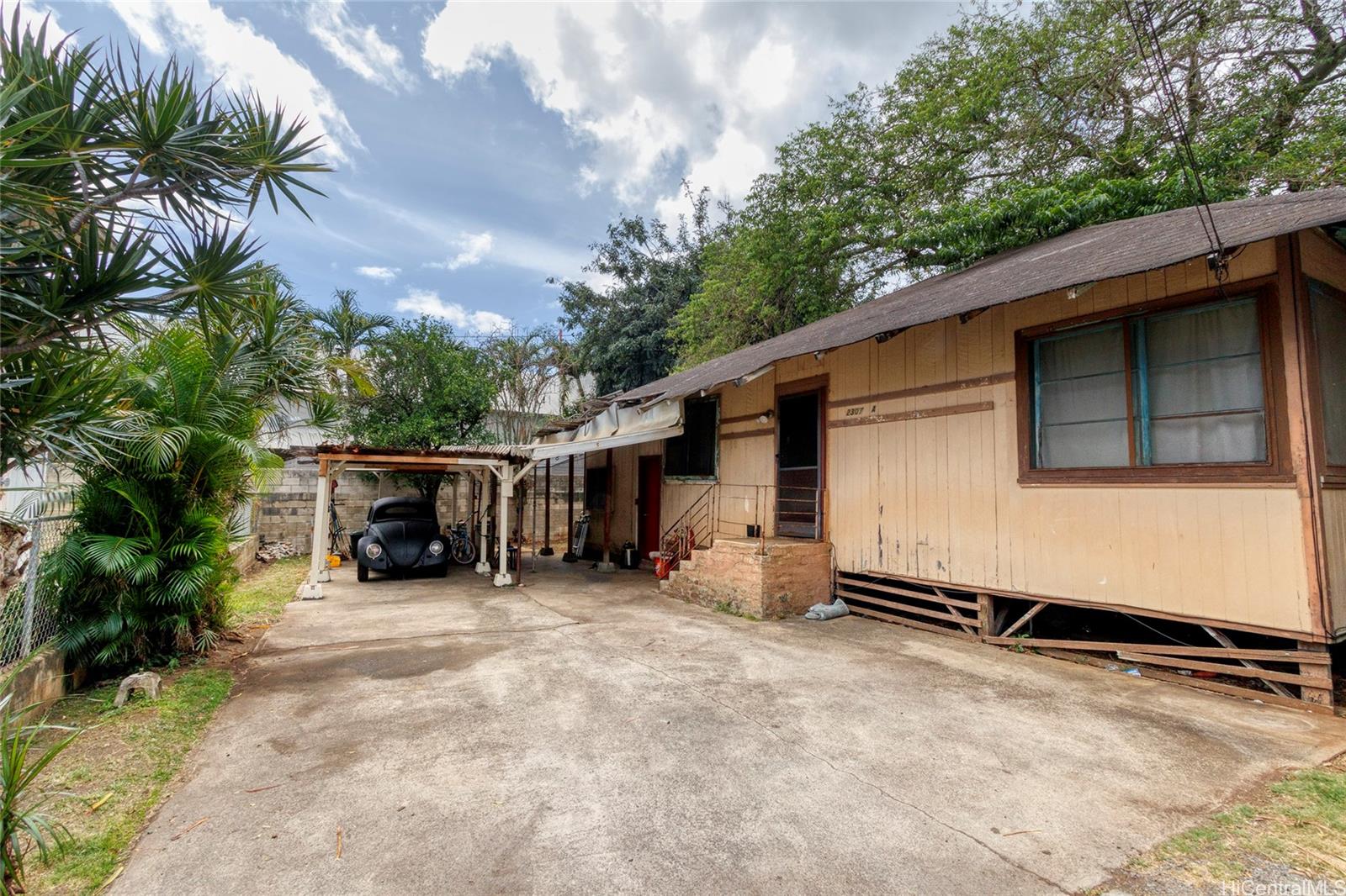 2307 North School Street, Unit A Honolulu, HI 96819 - Photo 1 of 1 a view of a house with a yard