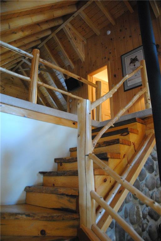 74 Blanchard Avenue Stratton, ME 04982 - Photo 25 of 35 Beautiful wood + rustic staircase.