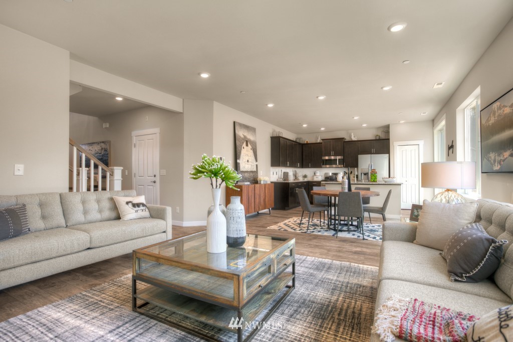 13 180th Place Southeast, Unit 40 Bothell, WA 98012 - Photo 13 of 40 a living room with furniture kitchen view and a table