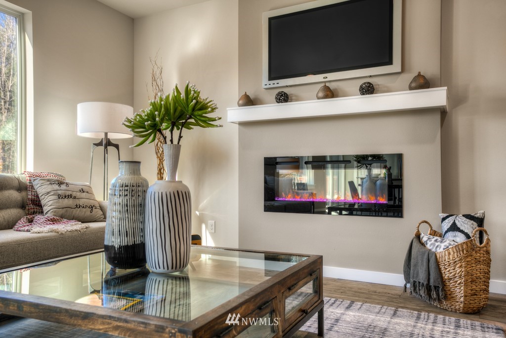 13 180th Place Southeast, Unit 40 Bothell, WA 98012 - Photo 14 of 40 a living room with furniture and a flat screen tv