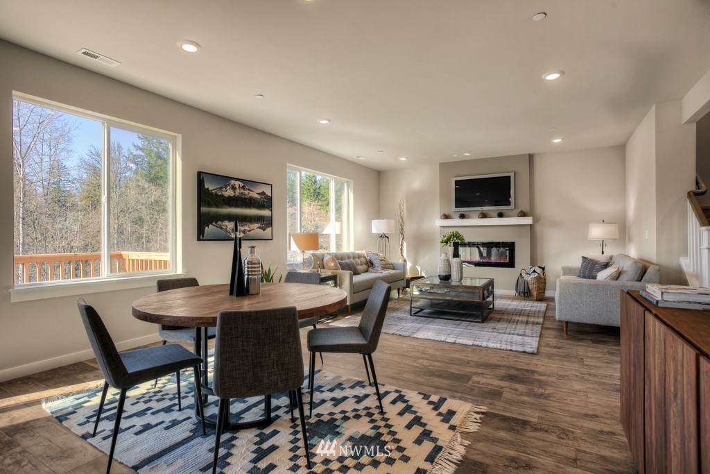 13 180th Place Southeast, Unit 40 Bothell, WA 98012 - Photo 21 of 40 a view of a dining room with furniture window and wooden floor