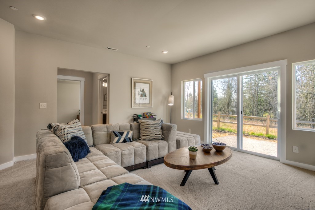 13 180th Place Southeast, Unit 40 Bothell, WA 98012 - Photo 24 of 40 a living room with furniture and a large window