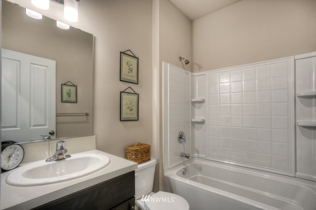 13 180th Place Southeast, Unit 40 Bothell, WA 98012 - Photo 26 of 40 a bathroom with a sink toilet and shower