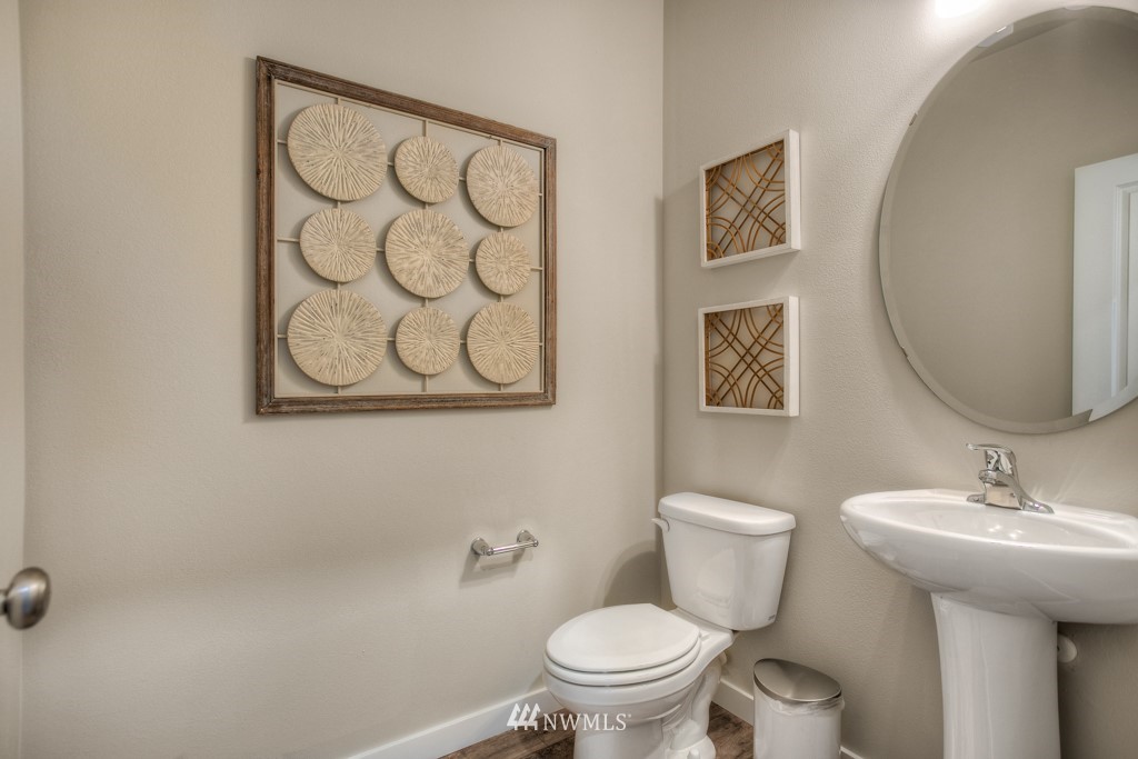 13 180th Place Southeast, Unit 40 Bothell, WA 98012 - Photo 6 of 40 a bathroom with a toilet sink and mirror