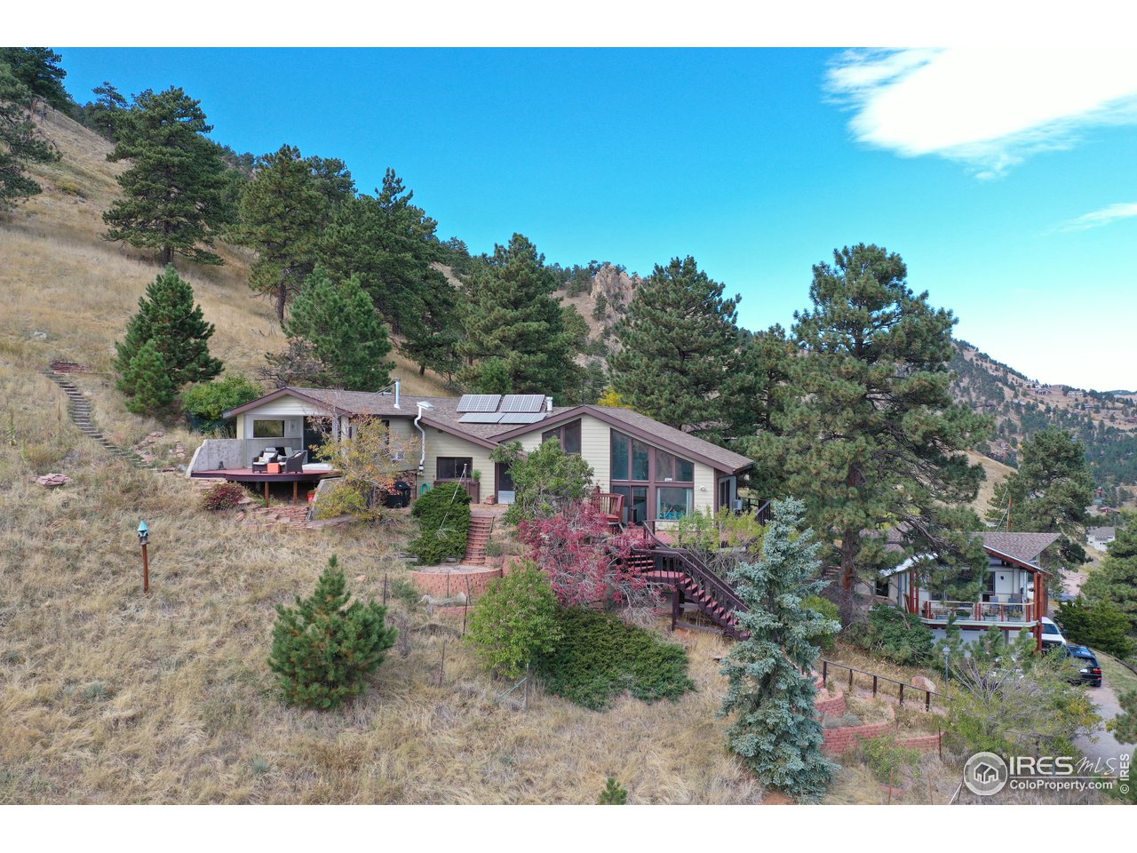 57 Acorn Lane Boulder, CO 80304 - Photo 1 of 40 a view of a house with a yard