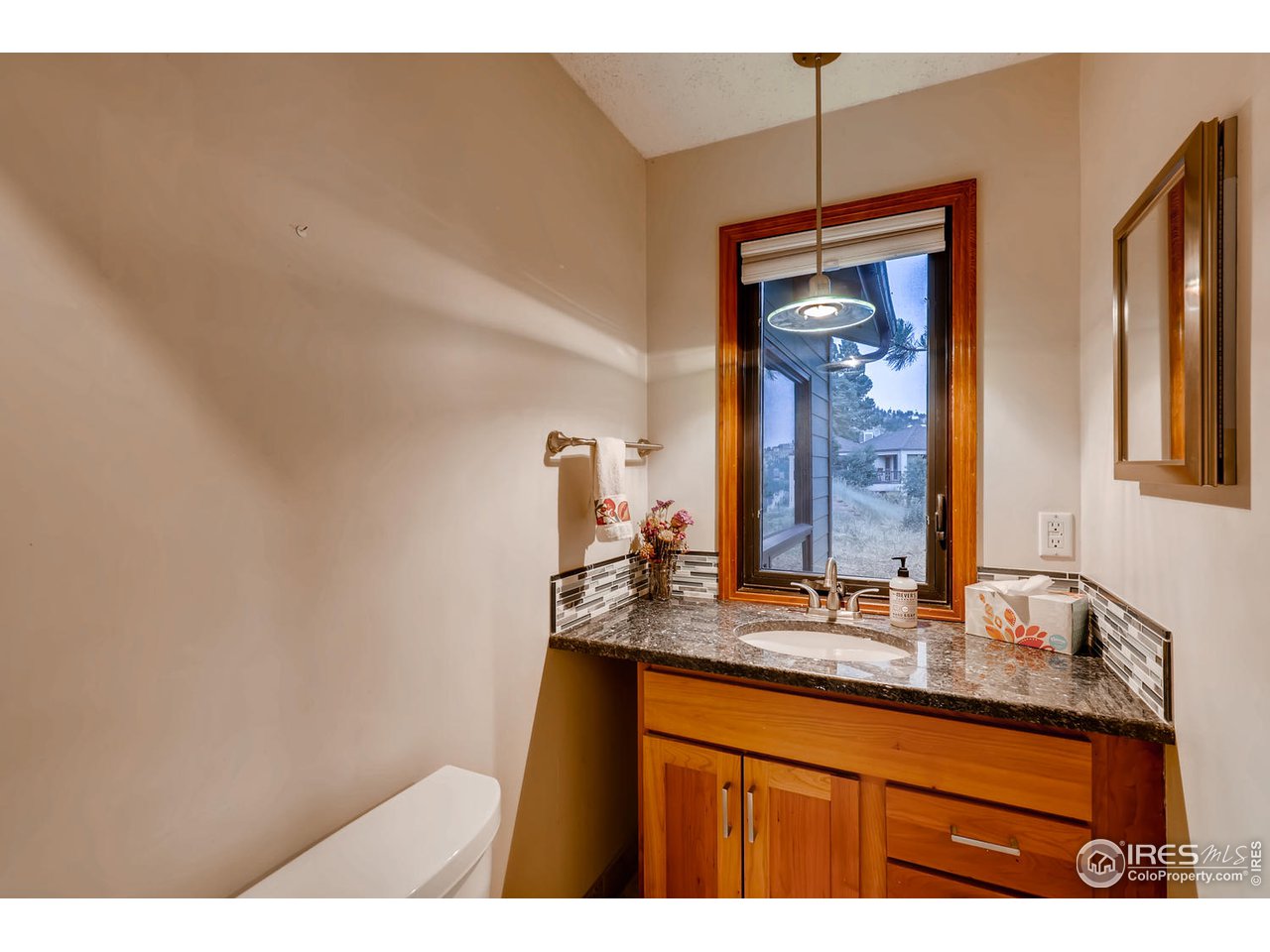 57 Acorn Lane Boulder, CO 80304 - Photo 16 of 40 a bathroom with a sink and a mirror