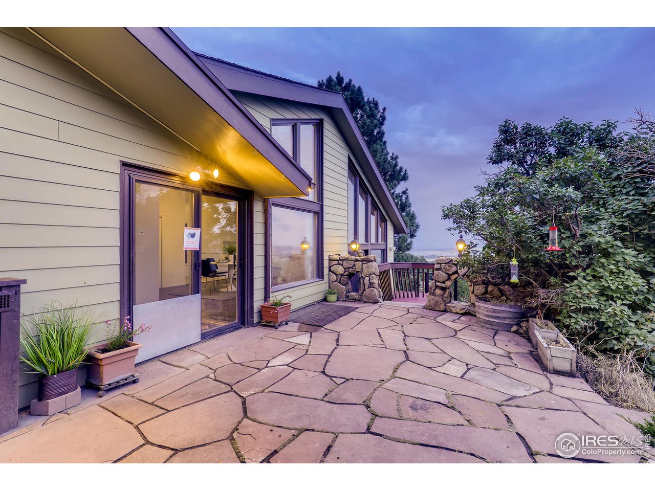 57 Acorn Lane Boulder, CO 80304 - Photo 21 of 40 a view of a house with backyard and sitting area