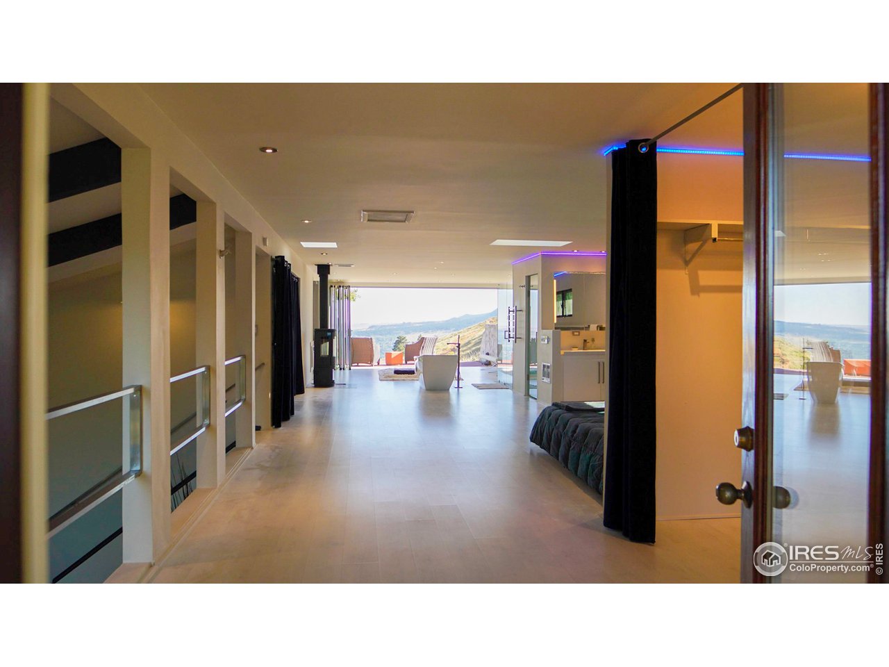 57 Acorn Lane Boulder, CO 80304 - Photo 5 of 40 a open kitchen with stainless steel appliances kitchen island granite countertop a refrigerator and cabinets