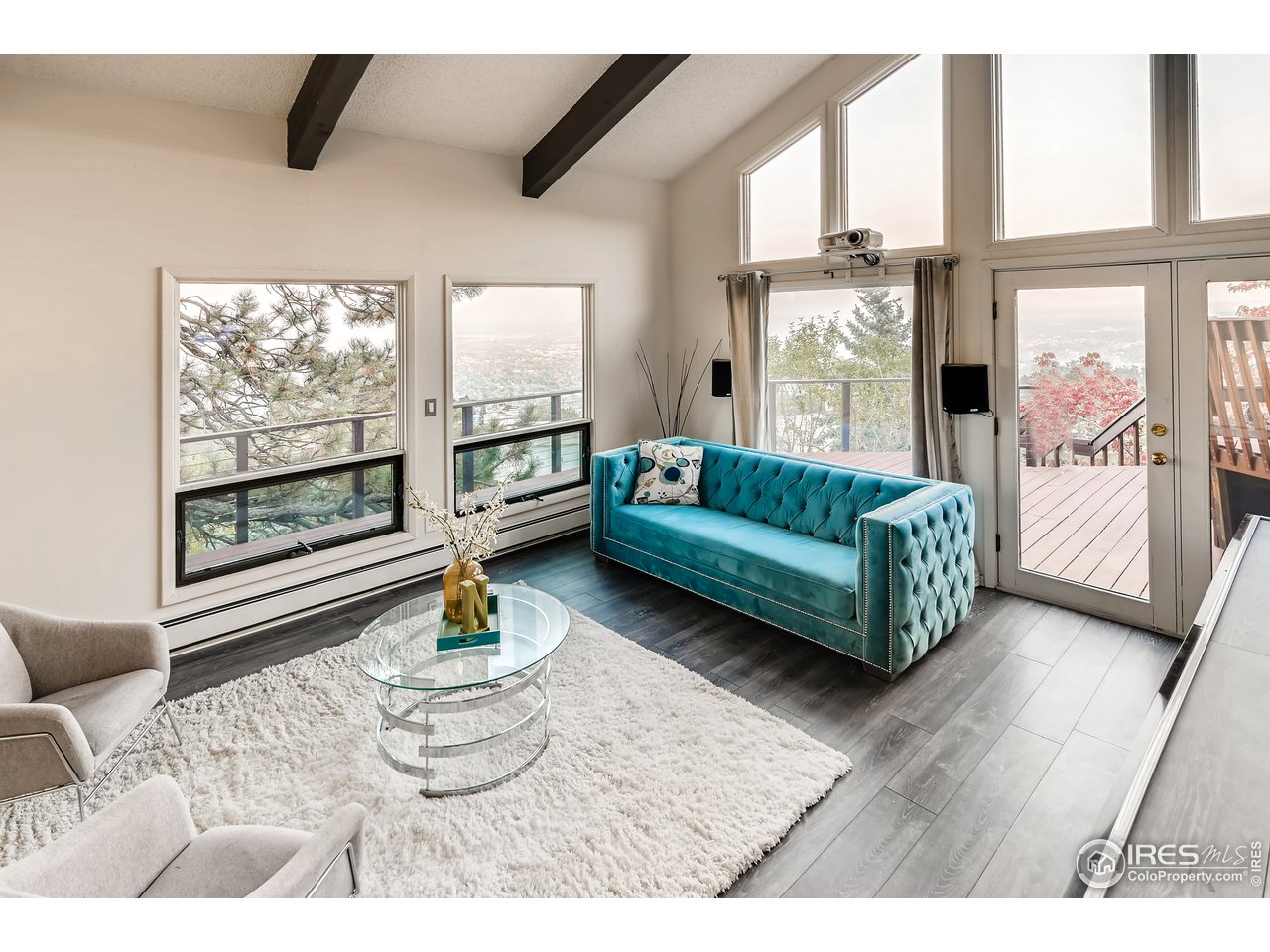 57 Acorn Lane Boulder, CO 80304 - Photo 8 of 40 a living room with furniture and a large window