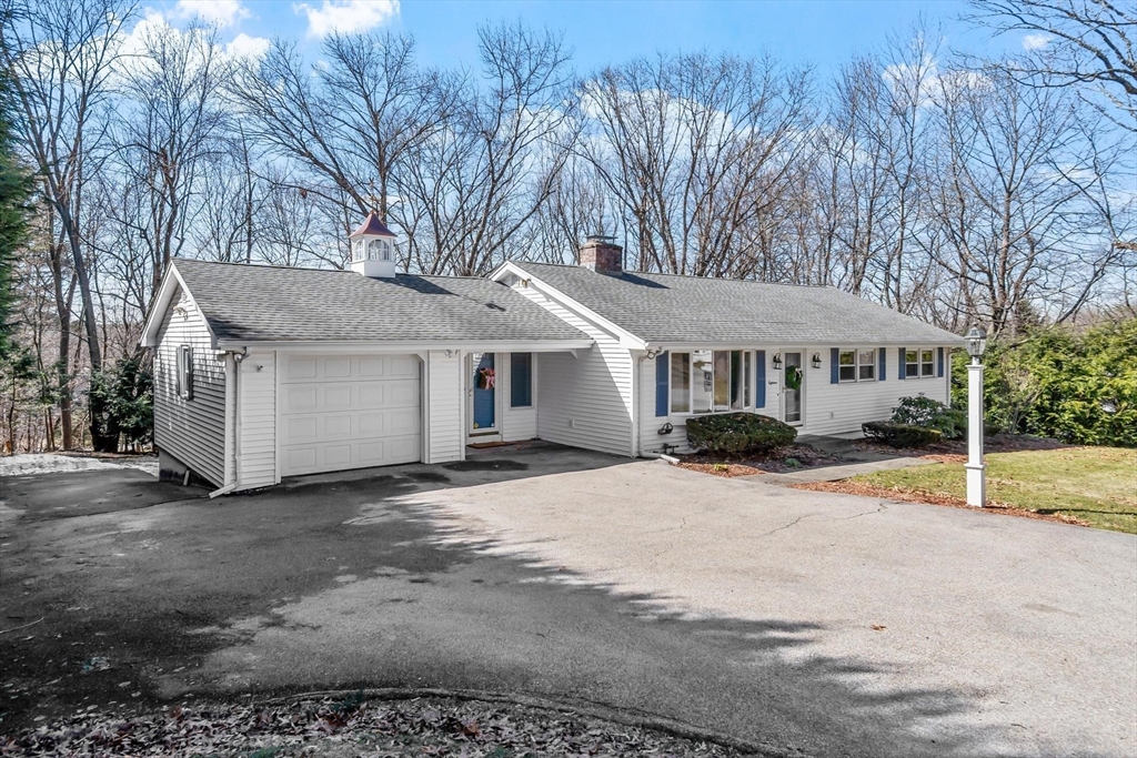18 Howe Avenue Shrewsbury, MA 01545 - Photo 2 of 42 a view of a white house with a yard covered in the road