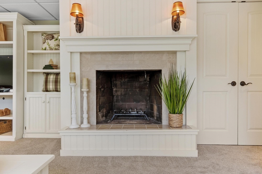 18 Howe Avenue Shrewsbury, MA 01545 - Photo 24 of 42 a white building with a potted plant