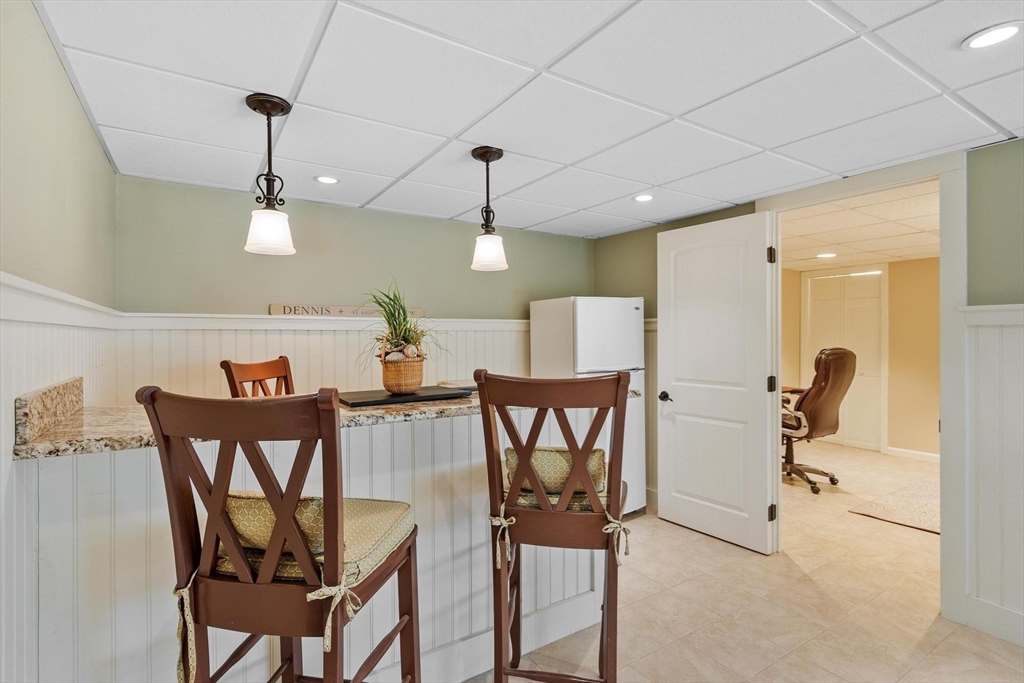 18 Howe Avenue Shrewsbury, MA 01545 - Photo 27 of 42 a view of a dining room with furniture