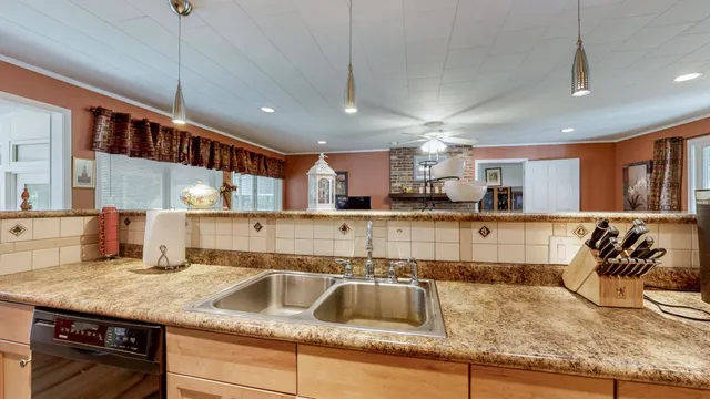 a bedroom with a bed and a view of balcony