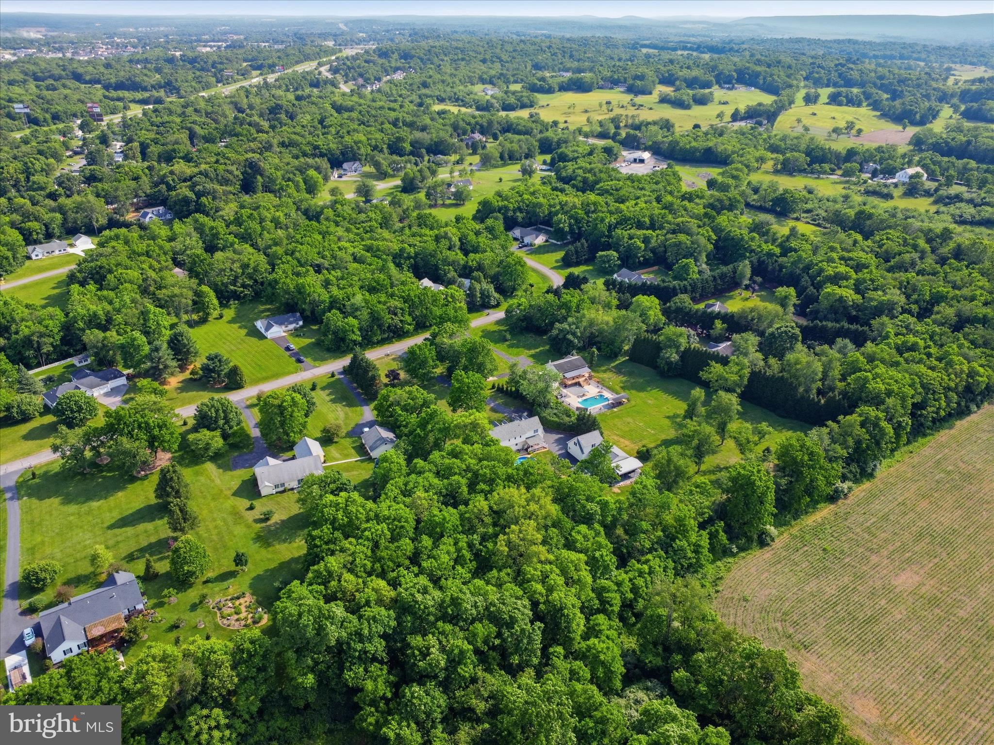 726 Doe Run Road Inwood, WV 25428 - Photo 64 of 68 an aerial view of a houses with a yard