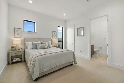 a bathroom with a sink toilet and vanity