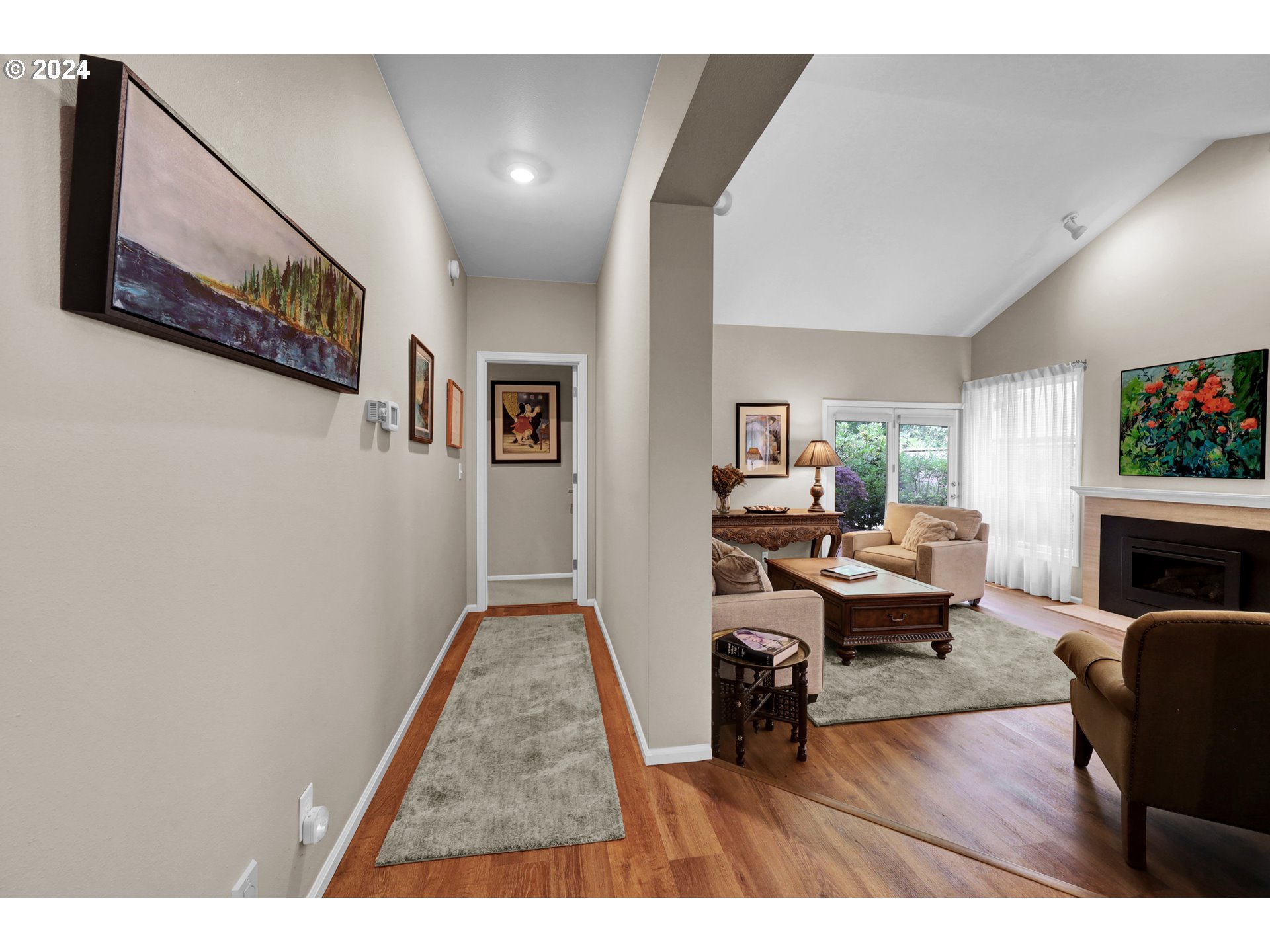 1281 Spyglass Drive Eugene, OR 97401 - Photo 12 of 37 a living room with furniture and a wooden floor