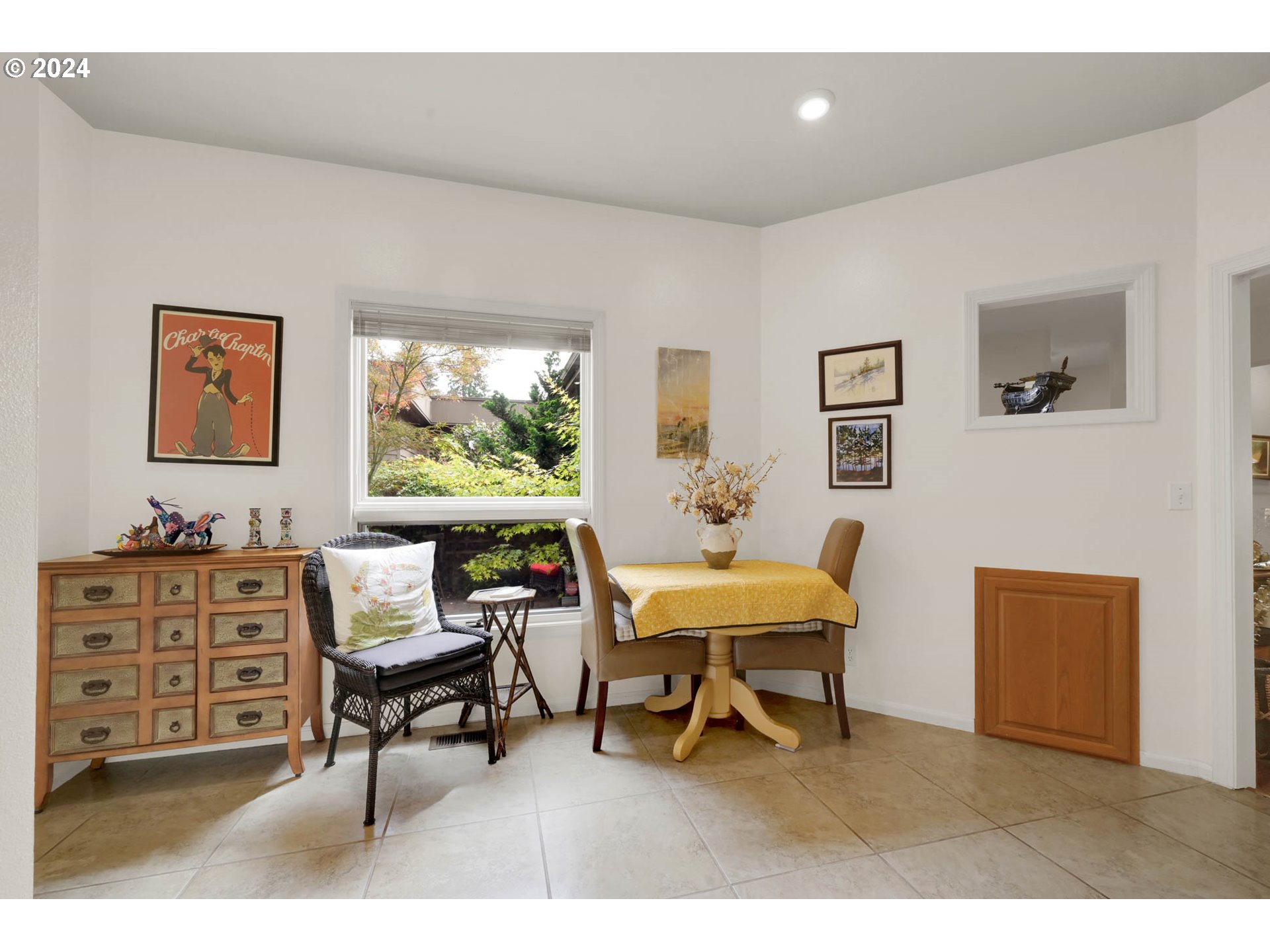 1281 Spyglass Drive Eugene, OR 97401 - Photo 13 of 37 a living room with furniture a piano and a window