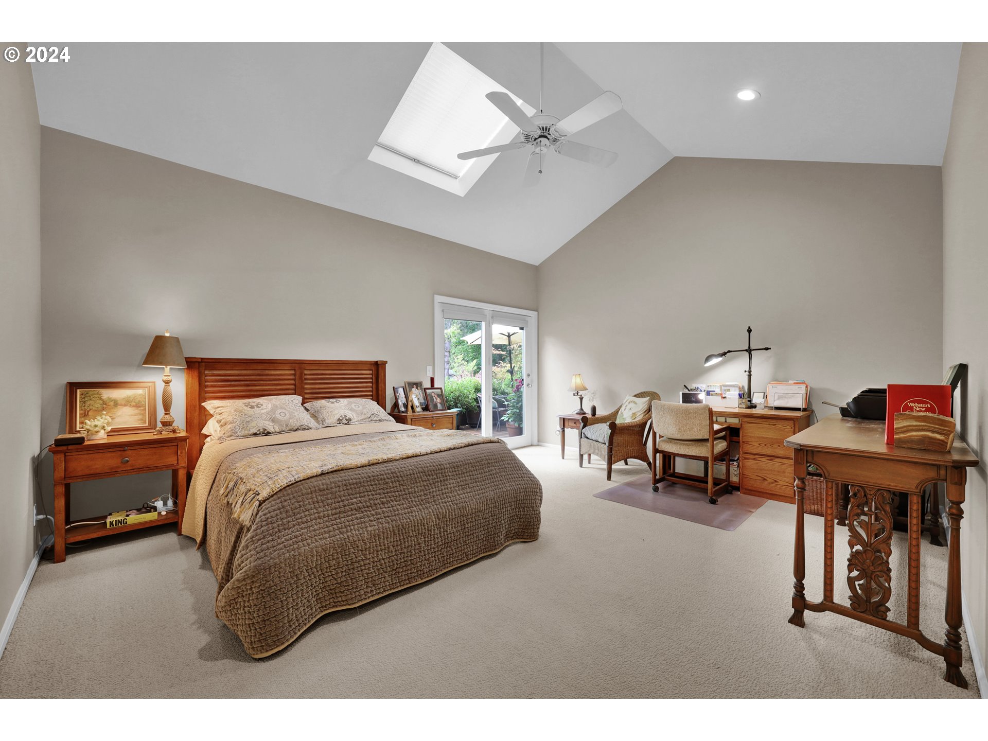 1281 Spyglass Drive Eugene, OR 97401 - Photo 19 of 37 a bedroom with furniture and a chandelier